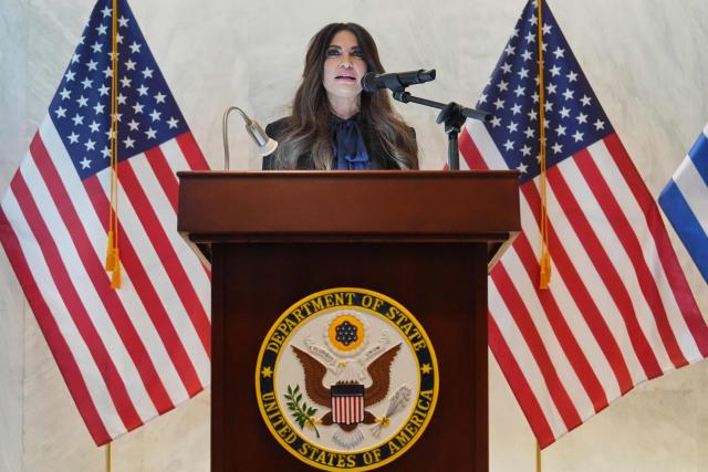 US Ambassador to Greece Kimberly Guilfoyle speaks during a dedication ceremony at the chancery of the US Embassy in Athens, on October 7, 2026. (Photo by Mark Schiefelbein / POOL / AFP)