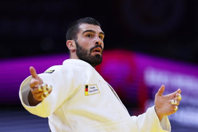 Georgia's Tato Grigalashvili reacts after winning the men's under 81 kg semi-final at the World Judo Championships in Baku on October 7, 2026. (Photo by Anne-Christine POUJOULAT / AFP)