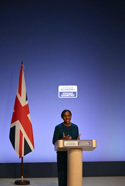 Britain's main opposition Conservative Party leader Kemi Badenoch addresses delegates on the final day of the annual Conservative Party conference in Birmingham, central England, on October 7, 2026.  (Photo by Paul ELLIS / AFP)
