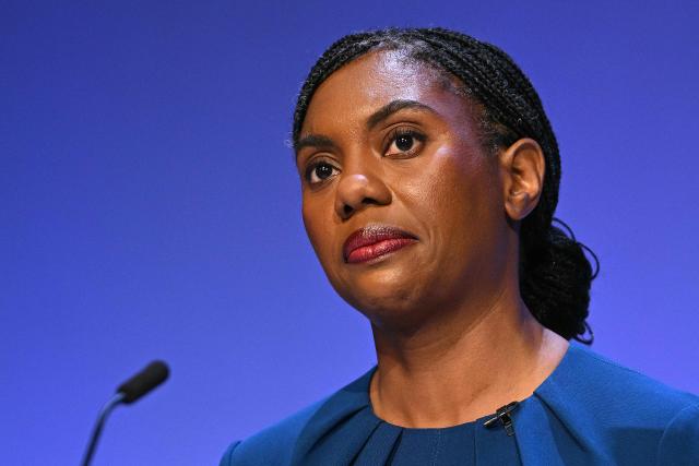 Britain's main opposition Conservative Party leader Kemi Badenoch addresses delegates on the final day of the annual Conservative Party conference in Birmingham, central England, on October 7, 2026.  (Photo by Oli SCARFF / AFP)