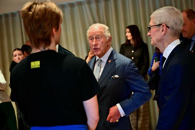 Britain's King Charles III speaks to a mentor during a visit to a music workshop for young people, the first as part of the Apple x King’s Trust Creative Labs, at Battersea Power Station in south west London on October 7, 2026. (Photo by Ben STANSALL / POOL / AFP)