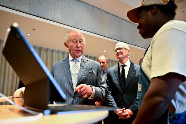 Britain's King Charles III reacts as he joins a music workshop for young people, the first as part of the Apple x King’s Trust Creative Labs, at Battersea Power Station in south west London on October 7, 2026. (Photo by Ben STANSALL / POOL / AFP)