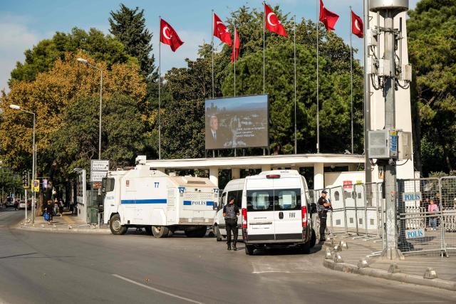 This photograph shows police fences and a water cannon as Turkish Police block Lozan square due to potential protests after Izmir mayor joined the ruling Justice and Development Party (AKP) in Izmir, on October 7, 2026. The mayor of Izmir, Turkey's third city and an opposition stronghold, on Wednesday defected to the ruling AKP, in a huge symbolic victory for Turkish President Recep Tayyip Erdogan. Mayor Cemil Tugay's decision to join the Islamic-rooted Justice and Development Party (AKP) was announced by Erdogan at a parliamentary group meeting in Ankara where he personally welcomed the mayor in a party-like atmosphere broadcast live on TV. (Photo by Murat Kocabas / AFP)