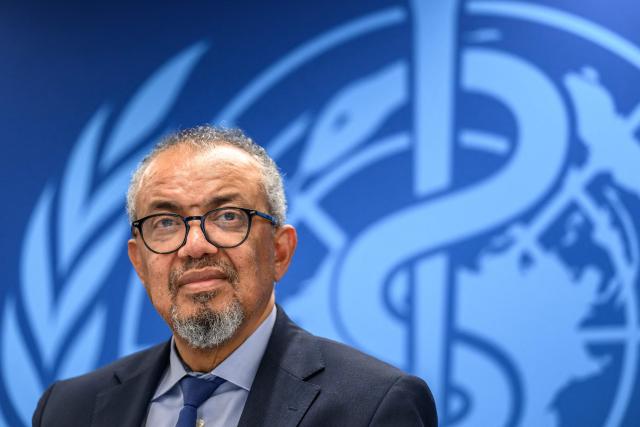 World Health Organization (WHO) Director-General Tedros Adhanom Ghebreyesus looks on during a press conference on global health issues, in Geneva, on October 7, 2026. The WHO said it wanted more information from Russia on the death of a plague laboratory technician -- and on reports of "a second employee with pneumonia of undetermined cause". WHO's chief said full transparency was needed in order to make a proper assessment of the public health risk. (Photo by Fabrice COFFRINI / AFP)