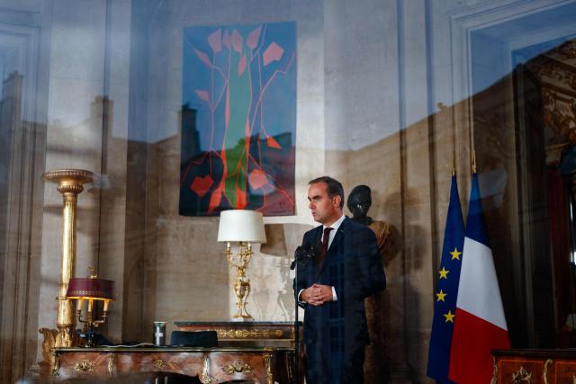 France's Prime Minister Sebastien Lecornu makes a statement regarding the situation in high schools, fuel prices, the agricultural crisis, and the France's financial situation at the Hotel de Matignon in Paris on October 7, 2026. (Photo by Dimitar DILKOFF / POOL / AFP)