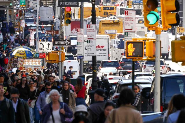 Pedestrians and cars move along Broadway in the Manhattan borough of New York City on October 7, 2026. (Photo by CHARLY TRIBALLEAU / AFP)