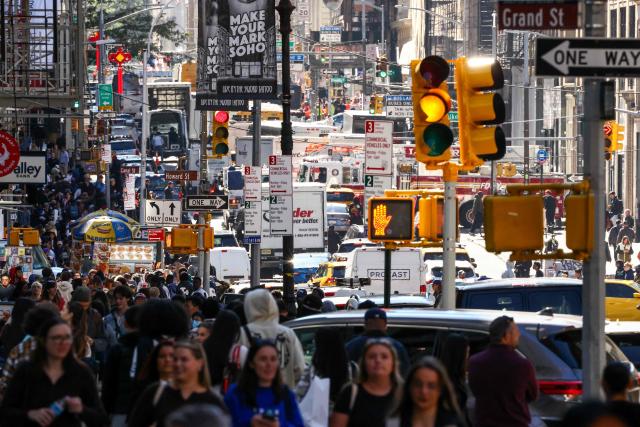 Pedestrians and cars move along Broadway in the Manhattan borough of New York City on October 7, 2026. (Photo by CHARLY TRIBALLEAU / AFP)