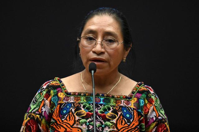 Mayan leader Maria Elias speaks at a ceremony during which Guatemala's President Bernardo Arevalo issued a public apology on behalf of the state to Indigenous leaders accused of leading the 2023 protests demanding the resignation of then Attorney General Consuelo Porras and respect for the presidential election results, at the National Palace of Culture in Guatemala City on October 7, 2026. (Photo by Johan ORDONEZ / AFP)