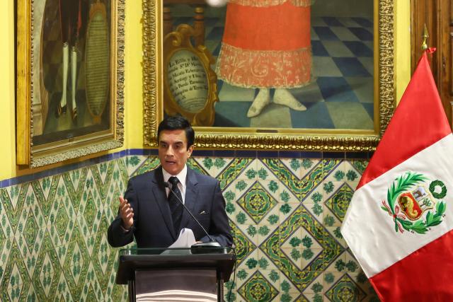 Peruvian Foreign Minister Carlos Espa speaks during a ceremony marking the handover of 342 cultural artefacts repatriated from six countries to the Ministry of Culture, at the Foreign Ministry headquarters in Lima on October 7, 2026. (Photo by Connie FRANCE / AFP)