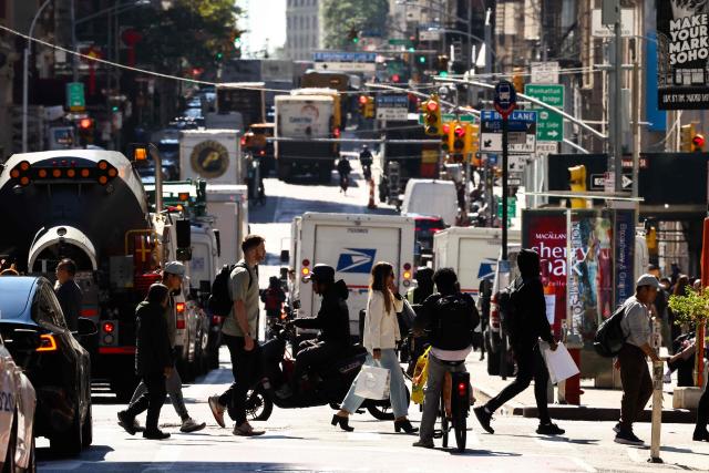 Pedestrians and cars move along Broadway in the Manhattan borough of New York City on October 7, 2026. (Photo by CHARLY TRIBALLEAU / AFP)