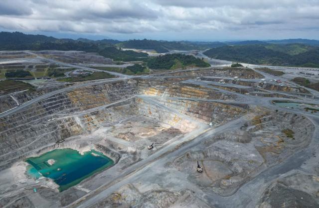 (FILES) Aerial view of Canadian First Quantum Panama copper mine in Donoso, Panama, on March 21, 2025. Panamanian environmentalists on October 7, 2026 described as "a deception of the country" a government commission's proposal to restart a Canadian-owned mine, Central America's largest open-pit copper deposit, which was shut down three years ago following massive protests. (Photo by MARTIN BERNETTI / AFP)