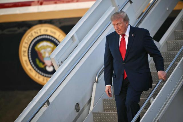 US President Donald Trump steps off Air Force One at Kelly Field in San Antonio, Texas, on October 7, 2026. Republican Senate candidate Ken Paxton is in a close race with Democratic candidate James Talarico for one of Texas' US Senate seats. (Photo by Mandel NGAN / AFP)