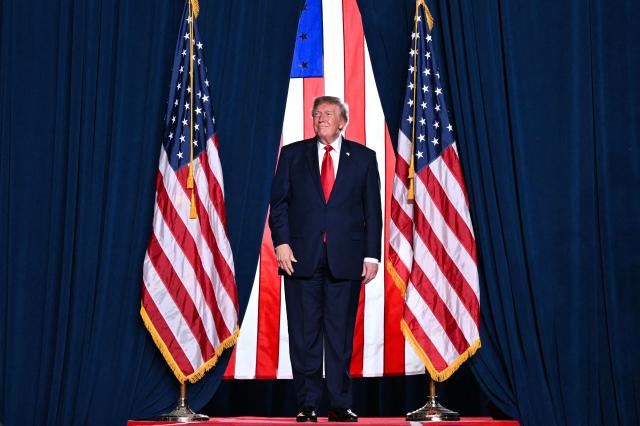 US President Donald Trump arrives to speak at a campaign rally at the Freeman Coliseum in San Antonio, Texas, on October 7, 2026. Republican Senate candidate Ken Paxton is in a close race with Democratic candidate James Talarico for one of Texas' US Senate seats. (Photo by Mandel NGAN / AFP)