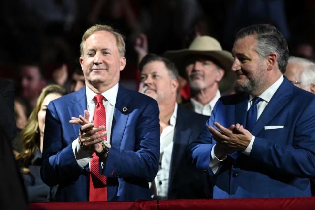 Republican candidate for US Senate Ken Paxton (L) and current Senator Ted Cruz (R-TX) applaud as US President Donald Trump speaks at a campaign rally at the Freeman Coliseum in San Antonio, Texas, on October 7, 2026. Republican Senate candidate Ken Paxton is in a close race with Democratic candidate James Talarico for one of Texas' US Senate seats. (Photo by Mandel NGAN / AFP)