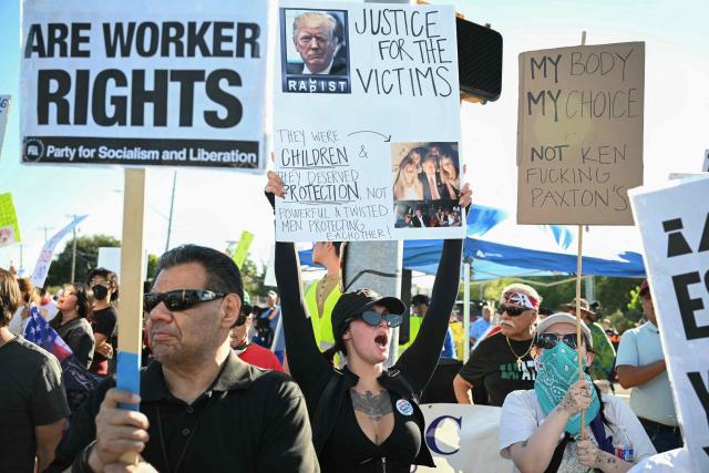 Protestors rally against US President Donald Trump outside of Freeman Coliseum, where Trump is speaking at a campaign rally, in San Antonio, Texas, on October 7, 2026. Republican Senate candidate Ken Paxton is in a close race with Democratic candidate James Talarico for one of Texas' US Senate seats. (Photo by RONALDO SCHEMIDT / AFP)
