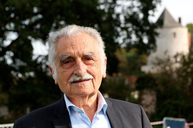 Peche Des Minieres, the owner of the village's castle, poses on the sidelines of the 11th edition of the Liettres Challenge 1478, an international cricket tournament, takes place in Liettres on October 3, 2026. The tournament, the brainchild of the Lille Cricket Club, was launched in 2015 to celebrate the hamlet's unlikely place in cricket history. According to organisers, Liettres was the site of the earliest recorded cricket match in history. (Photo by Francois LO PRESTI / AFP)