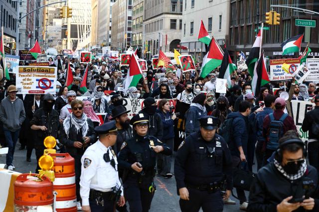 Pro Palestine demonstrators march during an anti-Israel protest in New York, on October 7, 2026. (Photo by CHARLY TRIBALLEAU / AFP)