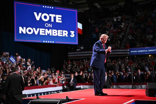 US President Donald Trump dances during a campaign rally at the Freeman Coliseum in San Antonio, Texas, on October 7, 2026. Republican Senate candidate Ken Paxton is in a close race with Democratic candidate James Talarico for one of Texas' US Senate seats. (Photo by Mandel NGAN / AFP)