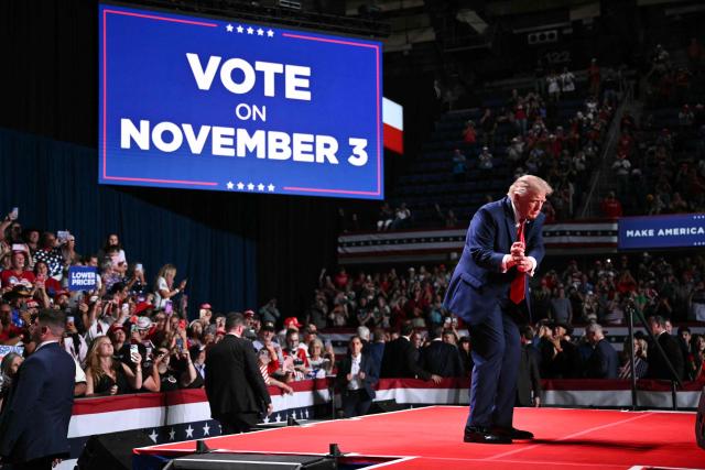 US President Donald Trump dances during a campaign rally at the Freeman Coliseum in San Antonio, Texas, on October 7, 2026. Republican Senate candidate Ken Paxton is in a close race with Democratic candidate James Talarico for one of Texas' US Senate seats. (Photo by Mandel NGAN / AFP)