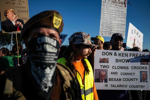Protestors rally against US President Donald Trump outside Freeman Coliseum, where Trump is speaking at a campaign rally, in San Antonio, Texas, on October 7, 2026. Republican Senate candidate Ken Paxton is in a close race with Democratic candidate James Talarico for one of Texas' US Senate seats. (Photo by RONALDO SCHEMIDT / AFP)