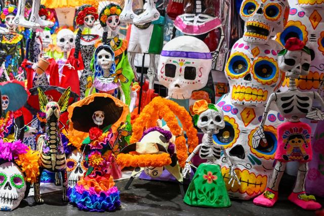 Skulls made using a traditional papier-mache technique are seen at the Jamaica Market in Mexico City on October 7, 2026. (Photo by Alfredo ESTRELLA / AFP)
