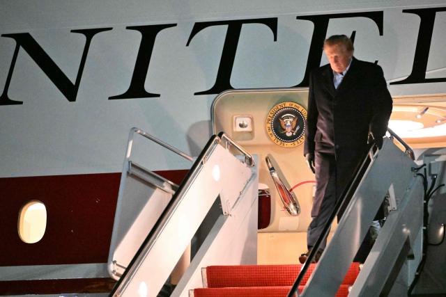 US President Donald Trump steps off Air Force One upon arrival at Joint Base Andrews, Maryland in the early hours of October 8, 2026. Trump is returning from San Antonio, Texas where he spoke at a midterm elections campaign rally. (Photo by Mandel NGAN / AFP)
