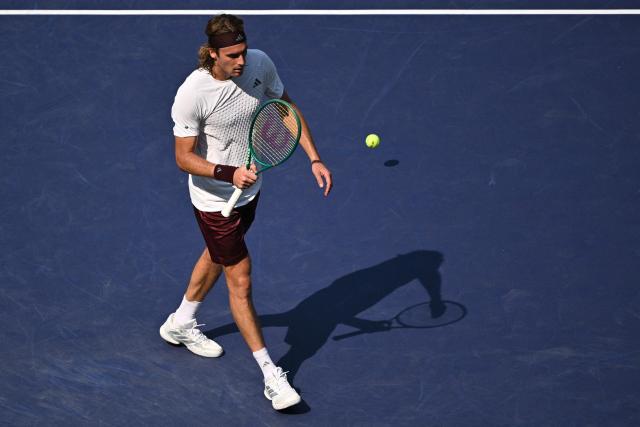 Greece's Stefanos Tsitsipas reacts after winning a point against Belgium's Kimmer Coppejans during their men's singles match at the Shanghai Masters tennis tournament in Shanghai on October 8, 2026. (Photo by Hector RETAMAL / AFP)