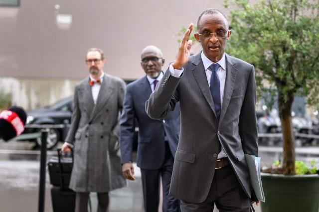 Secretary general of the Senegalese Football Federation Abdoulaye Sow (R) gestures upon his arrival at the Court of Arbitration for Sport (CAS) for a hearing on Senegal’s appeal against Morocco after a chaotic Africa Cup of Nations football final, in Lausanne, on October 8, 2026. Nearly ten months after a chaotic Africa Cup of Nations final, the dispute is set to reach its conclusion in Lausanne, where the Court of Arbitration for Sport (CAS) will hear Senegal’s appeal against Morocco being awarded the title. Senegal had initially won the January 18 final 1-0 after extra time, in a match marred by a lengthy walk-off over a controversial late penalty. (Photo by Fabrice COFFRINI / AFP)