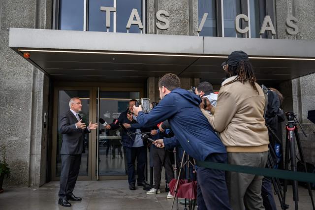 Court of Arbitration of Sport (CAS) director general Matthieu Reeb speaks to media during a hearing on Senegal’s appeal against Morocco following a chaotic Africa Cup of Nations football final, in Lausanne on October 8, 2026. Nearly ten months after a chaotic Africa Cup of Nations final, the dispute is set to reach its conclusion in Lausanne, where the Court of Arbitration for Sport (CAS) will hear Senegal’s appeal against Morocco being awarded the title. Senegal had initially won the January 18 final 1-0 after extra time, in a match marred by a lengthy walk-off over a controversial late penalty. (Photo by Fabrice COFFRINI / AFP)