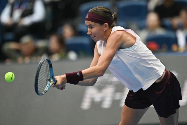 Czech Republic’s Nikola Bartunkova hits a return to Czech Republic’s Karolina Muchova during their women’s singles quarter-final match at the China Open tennis tournament in Beijing on October 8, 2026. (Photo by Pedro PARDO / AFP)