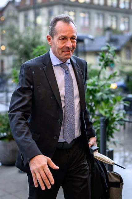 Secretary General of the Royal Moroccan Football Federation Tarik Najem (R) arrives at the Court of Arbitration for Sport (CAS) for a hearing on Senegal’s appeal against Morocco after a chaotic Africa Cup of Nations football final, in Lausanne, on October 8, 2026. Nearly ten months after a chaotic Africa Cup of Nations final, the dispute is set to reach its conclusion in Lausanne, where the Court of Arbitration for Sport (CAS) will hear Senegal’s appeal against Morocco being awarded the title. Senegal had initially won the January 18 final 1-0 after extra time, in a match marred by a lengthy walk-off over a controversial late penalty. (Photo by Fabrice COFFRINI / AFP)