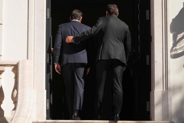 US Secretary of State Marco Rubio (L) is greeted by Portugal's Prime Minister Luis Montenegro prior to their meeting at the Sao Bento Palace in Lisbon on October 8, 2026. The US Secretary of State if on the last leg of a three-country European tour. (Photo by Mark Schiefelbein / POOL / AFP)
