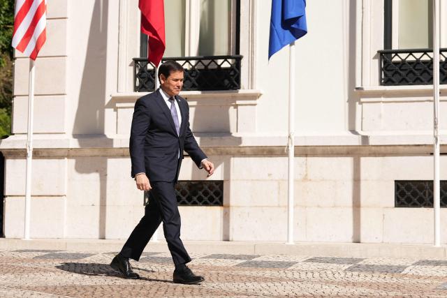 US Secretary of State Marco Rubio arrives for a meeting with Portugal's prime minister at the Sao Bento Palace in Lisbon on October 8, 2026. The US Secretary of State if on the last leg of a three-country European tour. (Photo by Mark Schiefelbein / POOL / AFP)