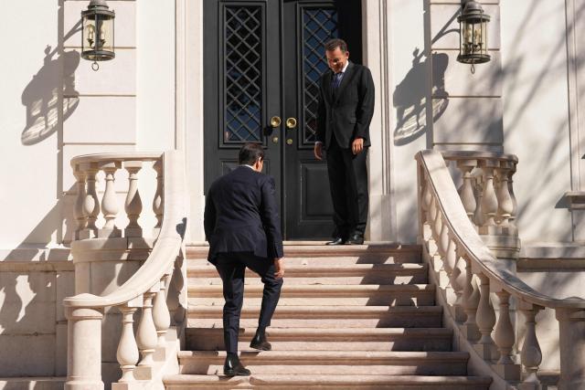 US Secretary of State Marco Rubio (L) is greeted by Portugal's Prime Minister Luis Montenegro prior to their meeting at the Sao Bento Palace in Lisbon on October 8, 2026. The US Secretary of State if on the last leg of a three-country European tour. (Photo by Mark Schiefelbein / POOL / AFP)