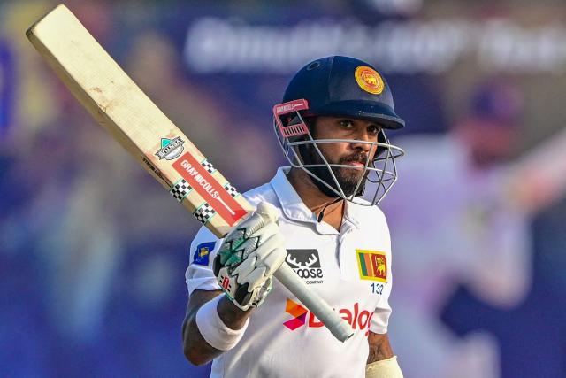 (FILES) Sri Lanka's Kusal Mendis celebrates after scoring a half-century (50 runs) during the first day of the second Test cricket match between Sri Lanka and Australia at the Galle International Cricket Stadium in Galle on February 6, 2025. Sri Lanka's cricket board appointed Kusal Mendis as the new Test captain on October 8, replacing Dhananjaya de Silva, who stepped down ahead of selection for next month's two-match series against Pakistan. (Photo by Ishara S. KODIKARA / AFP)