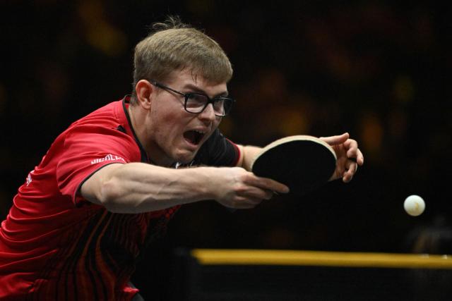 France’s Alexis Lebrun hits a return to South Korea’s Jang Woo-jin during their men’s singles match at the WTT China Smash table tennis tournament in Beijing on October 8, 2026. (Photo by ADEK BERRY / AFP)