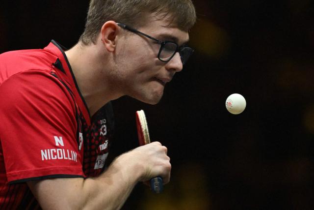 France’s Alexis Lebrun serves to South Korea’s Jang Woo-jin during their men’s singles match at the WTT China Smash table tennis tournament in Beijing on October 8, 2026. (Photo by ADEK BERRY / AFP)