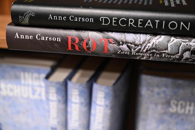 Books of 2026 Nobel Prize in Literature laureate Canadian writer Anne Carson are pictured on the S. Fischer publishing house booth at the 78th Frankfurt book fair, the world's biggest trade fair for books, in Frankfurt am Main, western Germany on October 8, 2026. From October 7 to 11, 2026, publishing experts will meet up with partners from the technology and creative industries such as film and games at one of the world’s leading venues for printed and digital content with the Czech republic as guest of honour. (Photo by Kirill KUDRYAVTSEV / AFP)