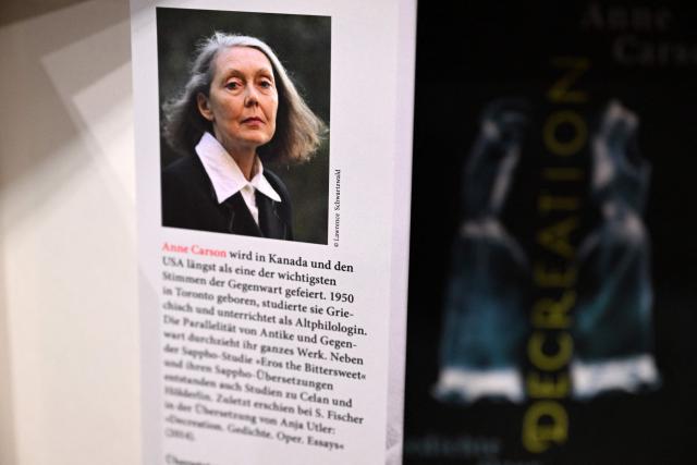 A book of 2026 Nobel Prize in Literature laureate Canadian writer Anne Carson is on display at the S. Fischer publishing house's booth at the 78th Frankfurt book fair, the world's biggest trade fair for books, in Frankfurt am Main, western Germany on October 8, 2026. From October 7 to 11, 2026, publishing experts will meet up with partners from the technology and creative industries such as film and games at one of the worlds leading venues for printed and digital content with the Czech republic as guest of honour. (Photo by Kirill KUDRYAVTSEV / AFP)