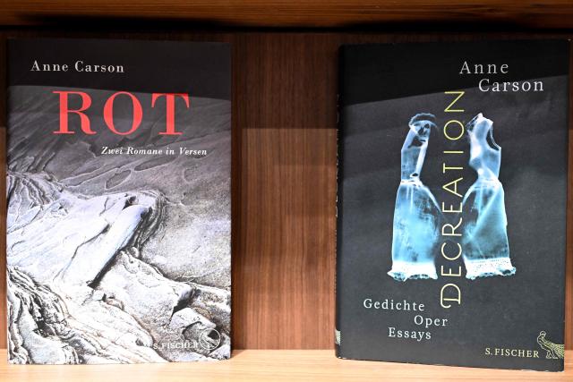 Books of 2026 Nobel Prize in Literature laureate Canadian writer Anne Carson are pictured on the S. Fischer publishing house booth at the 78th Frankfurt book fair, the world's biggest trade fair for books, in Frankfurt am Main, western Germany on October 8, 2026. From October 7 to 11, 2026, publishing experts will meet up with partners from the technology and creative industries such as film and games at one of the world’s leading venues for printed and digital content with the Czech republic as guest of honour. (Photo by Kirill KUDRYAVTSEV / AFP)
