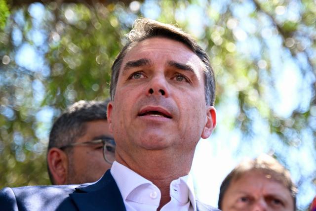 Brazil's right-wing senator and Liberal Party (PL) presidential candidate Flavio Bolsonaro speaks during a meeting with political party representatives to seek support ahead of the presidential run-off election, in Brasilia on October 8, 2026. (Photo by Evaristo Sa / AFP)