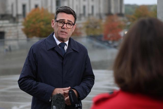 British Prime Minister Andy Burnham gives an tv interview following his meeting with the German Chancellor in Berlin on October 8, 2026 . (Photo by Sean GALLUP / POOL / AFP)
