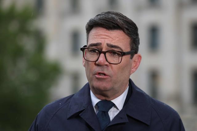 British Prime Minister Andy Burnham gives an tv interview following his meeting with the German Chancellor in Berlin on October 8, 2026 . (Photo by Sean GALLUP / POOL / AFP)