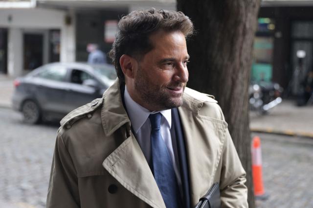 Prosecutor Patricio Ferrari arrives to the court for the hearing in arguments in the trial into Maradona's death, in San Isidro, Buenos Aires province, Argentina, on October 8, 2026. (Photo by AFP)