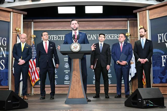 US Vice President JD Vance speaks alongside (L-R) White House Deputy Chief of Staff and Homeland Security Advisor Stephen Miller, US Attorney General Todd Blanche, US Labor Secretary Keith Sonderling, Inspector General of the US Department of Labor Anthony D'Esposito and Federal Trade Commission (FTC) Chair Andrew Ferguson during a press conference to provide an update in the federal investigation and crackdown regarding fraud and abuse of the H-1B visa program in Washington, DC, on October 8, 2026. (Photo by Alex WROBLEWSKI / AFP)