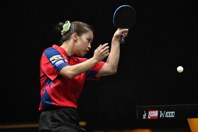 Thailand's Orawan Paranang hits a return to Japan's Honoka Hashimoto during their women's singles match at the China WTT Smash table tennis tournament in Beijing on October 8, 2026. (Photo by ADEK BERRY / AFP)