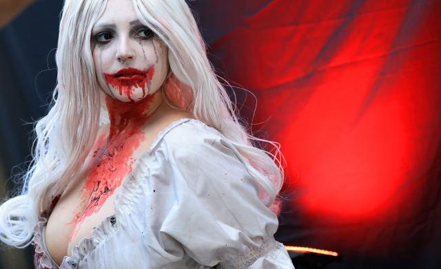 A cosplayer poses for a photograph during the New York Comic Con on its 20th anniversary at the Javits Center in New York, on October 8, 2026. The four-day event is the largest comics and pop culture event on the East Coast. (Photo by TIMOTHY A. CLARY / AFP)