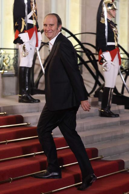 CEO of Iliad group and Free Xavier Niel arrives ahead of a state dinner hosted by France's President as part of the state visit of Germany's President, at The Elysee Presidential Palace in Paris on October 8, 2026. niel (Photo by Ludovic MARIN / AFP)