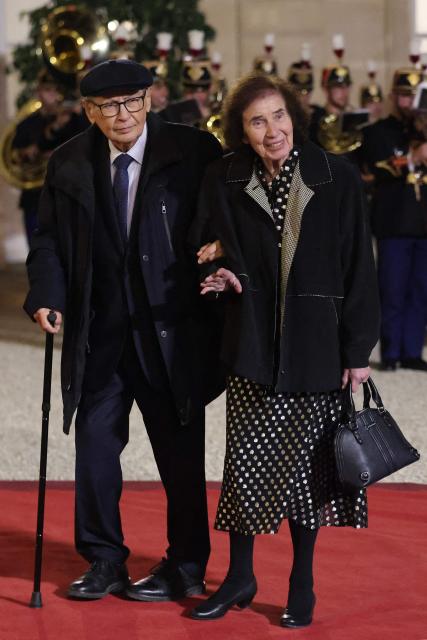 French activist and Nazi hunter Serge Klarsfeld and his wife Franco-German journalist and Nazi hunter Beate Klarsfeld pose upon arrival ahead of a state dinner hosted by France's President as part of the state visit of Germany's President, at The Elysee Presidential Palace in Paris on October 8, 2026. (Photo by Ludovic MARIN / AFP)