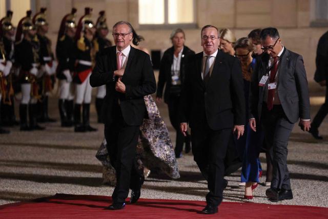 (From L) Germany's Minister of State for Europe Gunther Krichbaum, Germany's Defence Minister Boris Pistorius arrive ahead of a state dinner hosted by France's President as part of the state visit of Germany's President, at The Elysee Presidential Palace in Paris on October 8, 2026. (Photo by Ludovic MARIN / AFP)